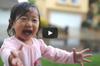 Little Girl Experiences First Rain