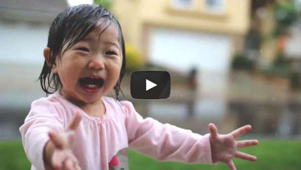 Little Girl Experiences First Rain