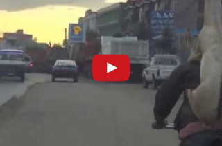 LOLWUT? A Goat Riding A Man Riding A Bicycle