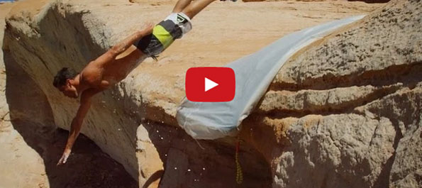Would You Ride A Slip N Slide Off A 50-Ft Cliff?