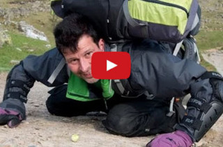 Man Pushing A Brussels Sprout Up A Hill With His Nose For Charity