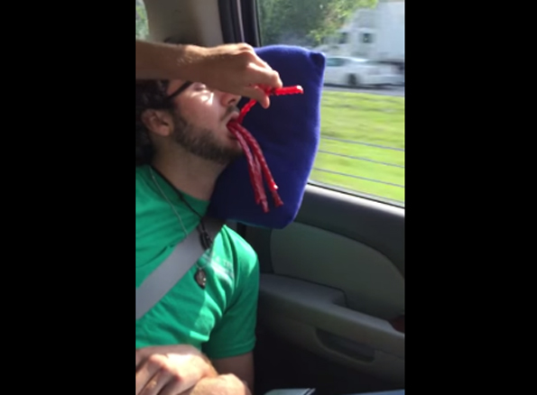 A Guy Passes Out So Naturally His Pals Stick Twizzlers In His Mouth