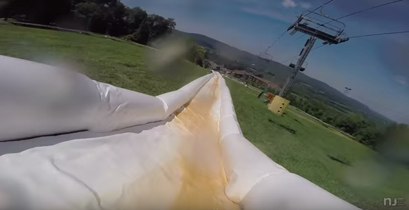 A First Person POV Video Of The World’s Longest Slip N Slide