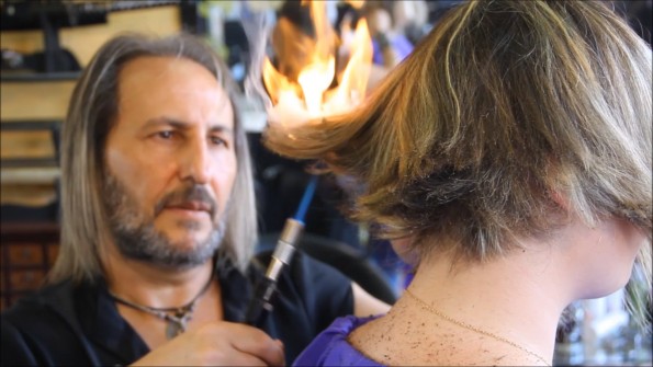 This Hair Stylist Uses Blowtorches, Samurai Swords, & Razor Talons To Cut Clients’ Hair