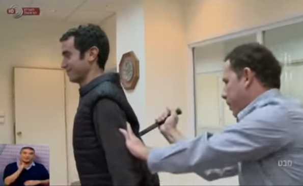 A Reporter Demonstrates An ALLEGED Stab-Proof Vest