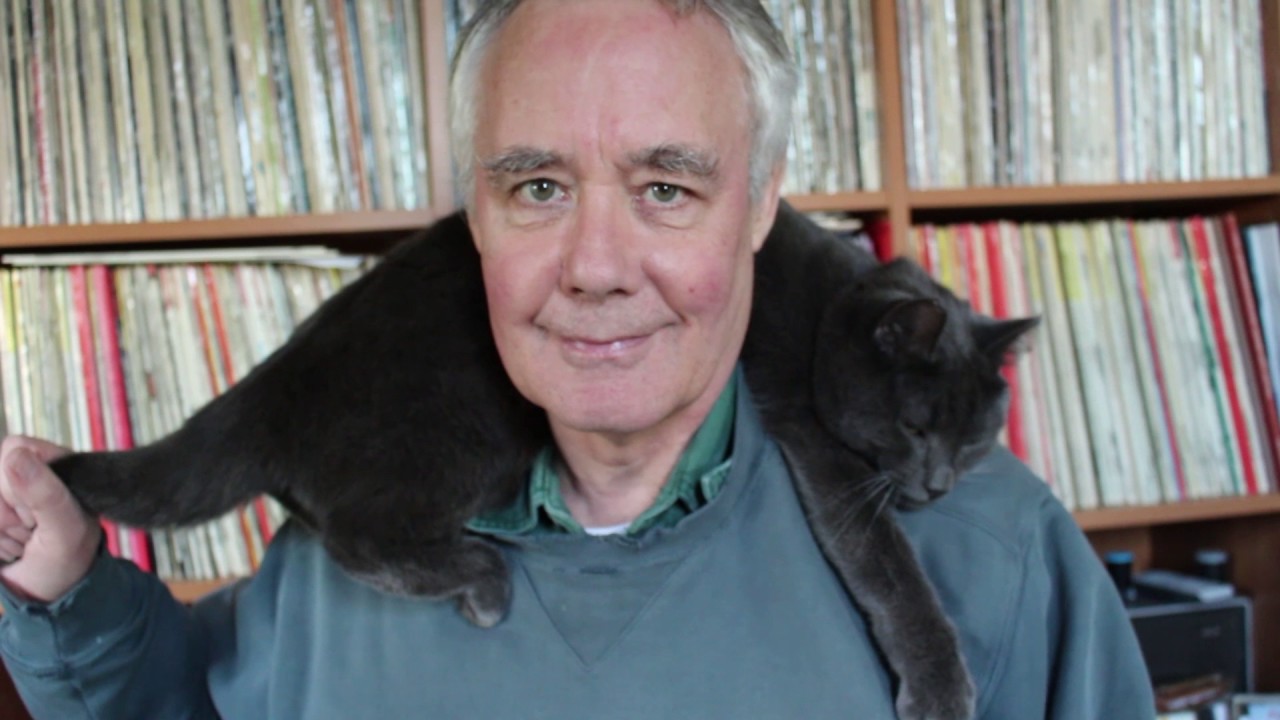 How To Put On A Sweater Without Disturbing Your Cat