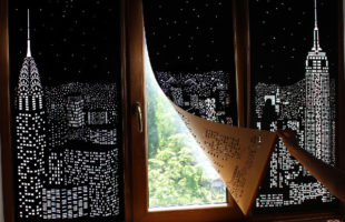 The HoleRoll Is A Perforated Blind That Shows A Cityscape