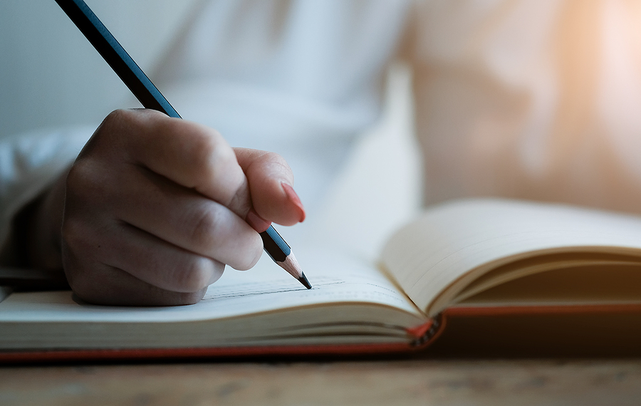 5 incredible applications for writing Woman Hand With Pencil Writing On Notebook. Making Notes In Note