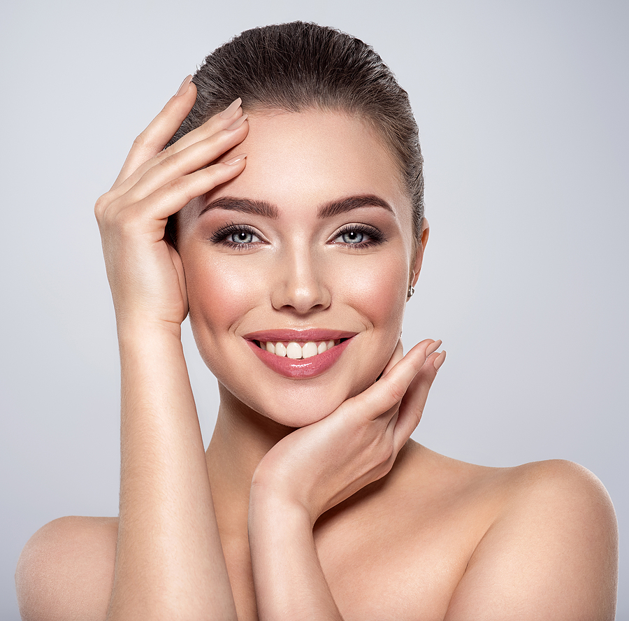 10 Secrets No One Has Told You About The Best Eyelash Serum, WooLash! Beauty face of the young beautiful smiling woman with a fresh h
