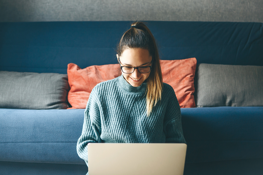 How to Convert MKV video formats to MP4 video formats Girl working on laptop from home or student studying from home or freelancer. Or she is watching a video or using the Internet