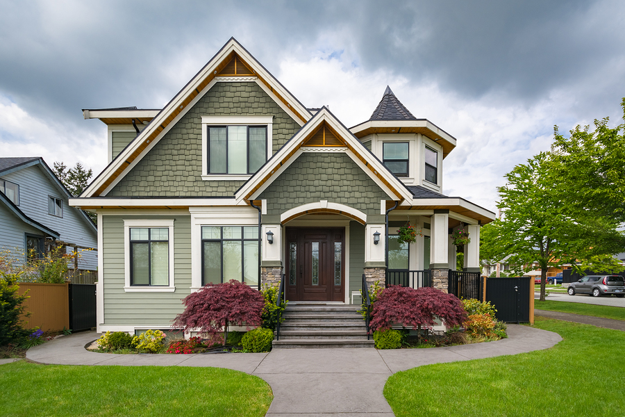 How to Create Your Own Southwestern Decorated Home Residential Family House With Concrete Pathway Over Green Lawn.