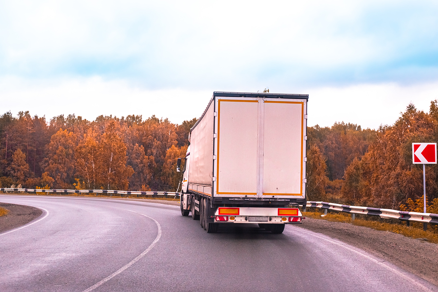 Things to Know About CDL Permits The Truck Goes Along The Highway Through The Autumn Forest, Turn