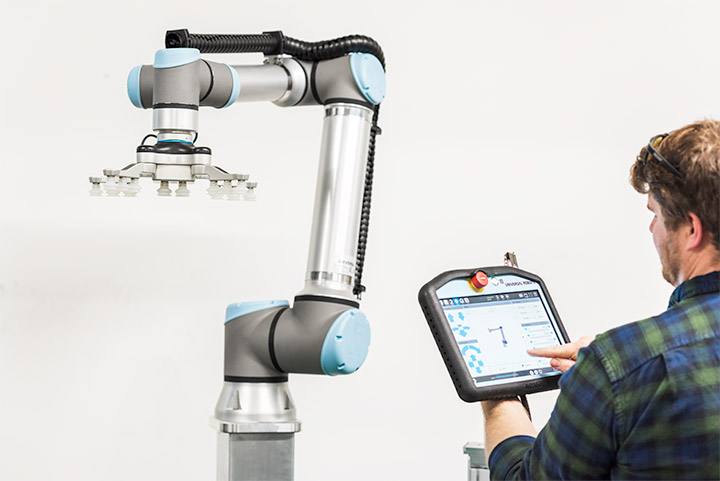 The Origins of Robotics in Manufacturing How-the-e-Series-Cobots-Integrate-Easily-into-Modular-Robot-Cells