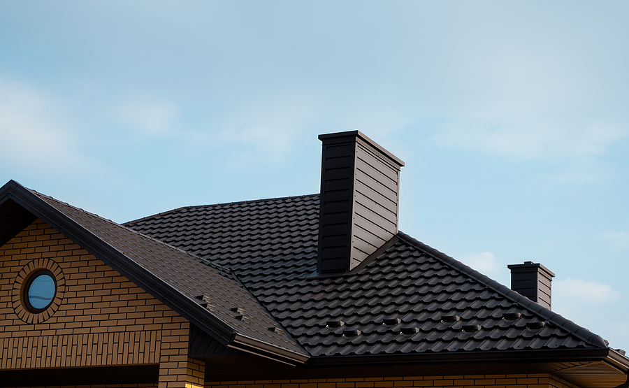 Brown Metal Tile Roof. Roof Metal Sheets. Modern Types Of Roofin