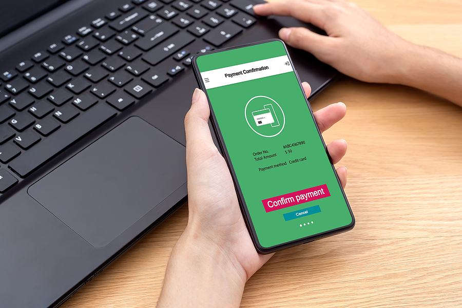 6 Exceptional Examples of Mobile-First Web UX Female using mobile smart phone online confirm payment for online shopping mobile payment. Concept banking and online shopping mobile payment.