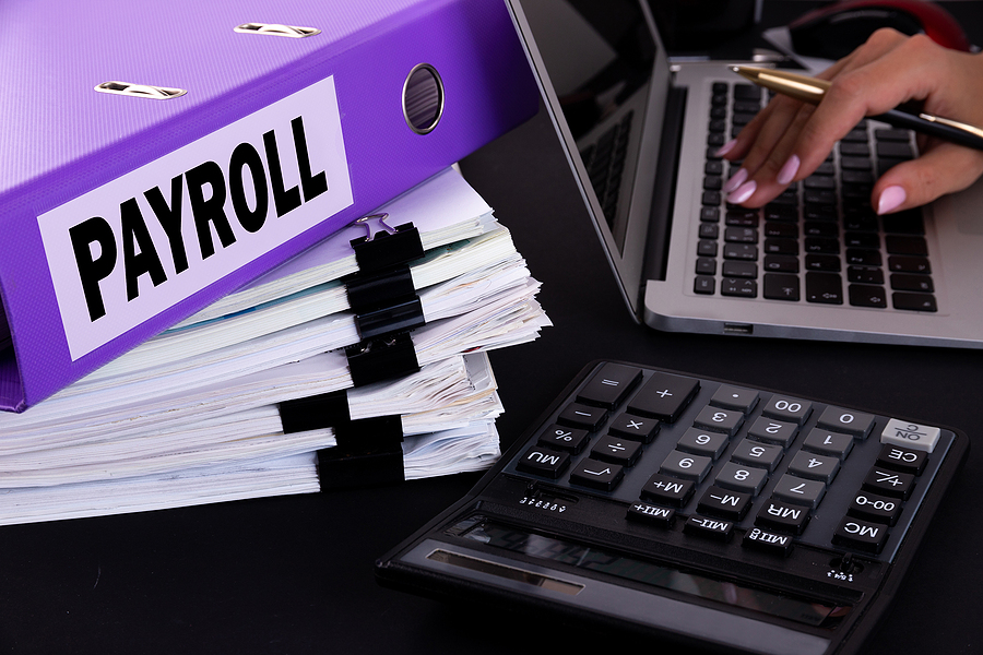 Text, Word Payroll Is Written On A Folder Lying On Documents On