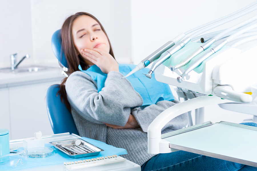 Immediate Steps You Can Take After Losing A Permanent Tooth Or Two Upset Sad Woman Is Holding Hand On Her Cheek, Teeth, Sitting In