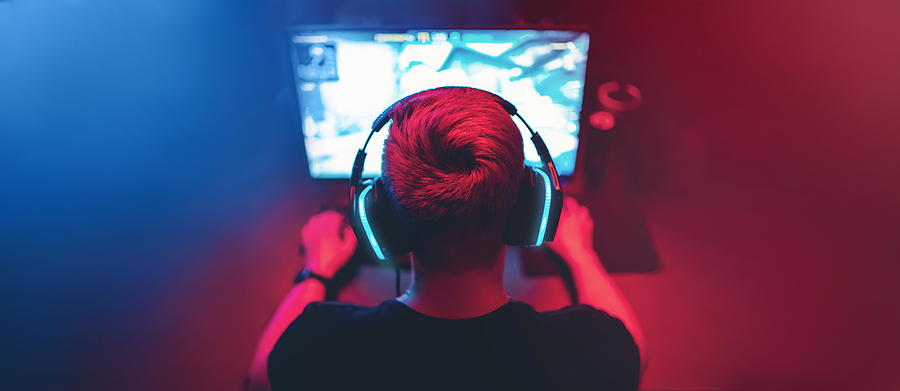 How Online Gaming Has Become A Social Lifeline Blurred Background Professional Gamer Playing Tournaments Online