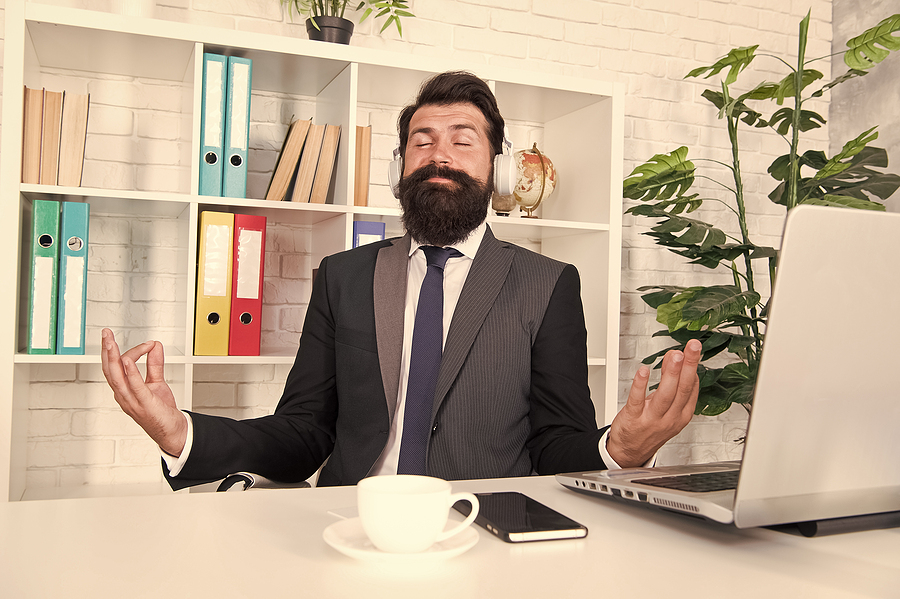 Keep calm and meditate. Bearded man meditate at workplace. Manager sit in meditation pose. Concentrate and meditate. Yoga mudra. Zen lifestyle. Its time to meditate. Just relax.