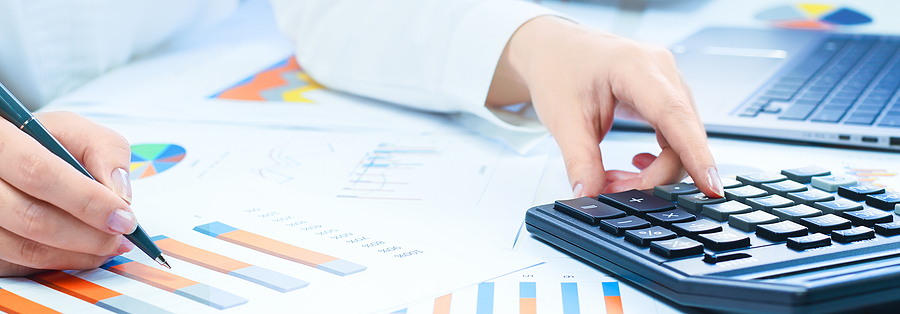 Applying For SBA Loans? Consider The Following Tips Carefully loan Finance and business concept. Female small business. Hand pointing at statistics chart. calculator on financial graphs on desk. Accounting budgeting loans or market analysis. finance office web banner