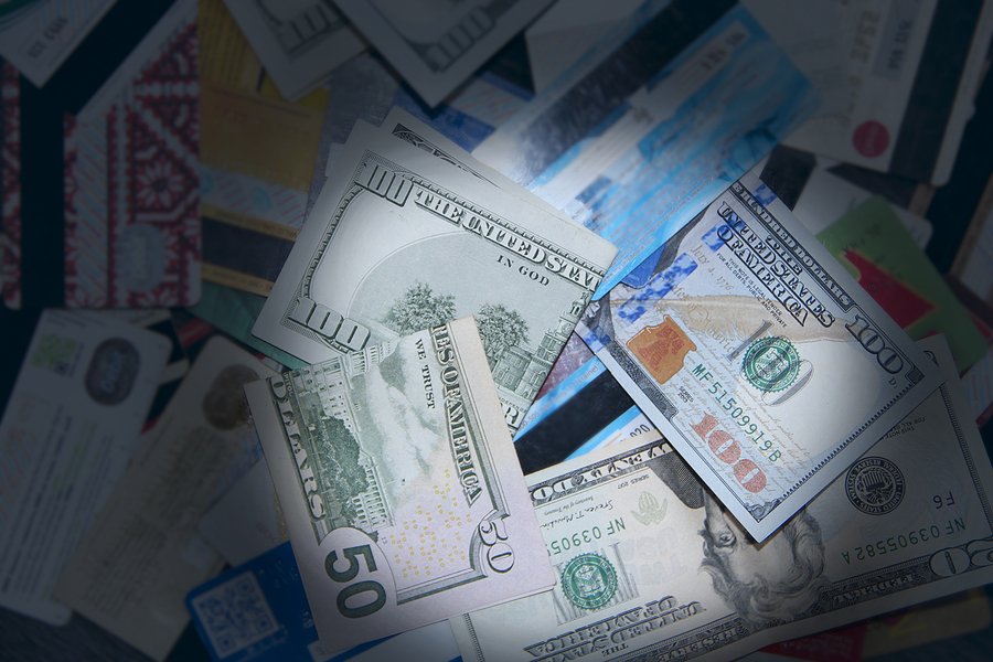 The Advantages of DeFi Explained Hundred Dollar Notes And Credit Cards. Pile Of Credit Cards In D