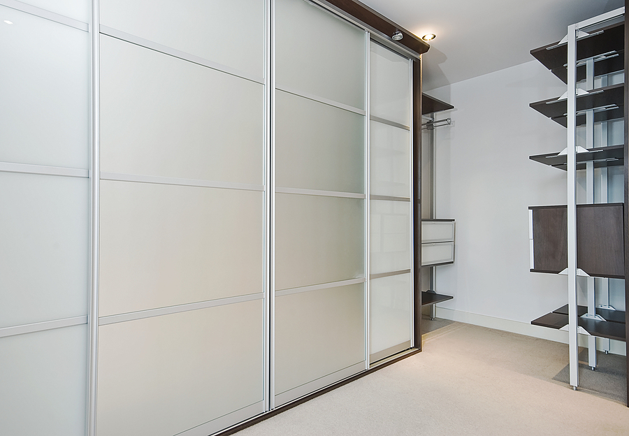 walk in wardrobe with large slide door shrinks and shelf storage