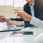 businessman investment consultant analyzing company financial report balance sheet statement working with digital graphs. Concept picture for stock market, cash, fund,and business economy flow.