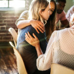 People support each other in a rehab session