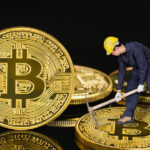 Bitcoin cryptocurrency digital bit coin BTC currency concept ,Bitcoin mining worker holding mattock digging golden Bitcoin crypto currency coin on a black background