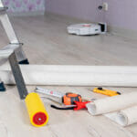 Floral wallpapers in the bedroom: 8 ideas and themes Close-up The Measuring Tape And The Wallpaper Smoothing Roller A