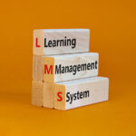 4 Tips For Choosing the Best Learning Management System Lms, Learning Management System Symbol. Wooden Blocks With Words