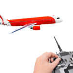 RC plane and radio remote control isolated on white background