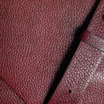 Genuine Leather Of Burgundy Color. Natural Textured Leather Back