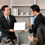 What are the benefits of Cisco certified for IT jobs? Employee Gets A Certificate Of Achievement, Businesspeople With