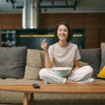 Smiling Young Girl With Popcorn Watching Tv Series Or Movie, Sit
