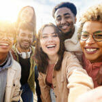 United Group Of Happy Young Friends Having Fun While Taking A Se