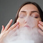 How to make a home moisturizer and their characteristics Young Woman With Long Brunette Hair Does Steam Therapy Cleaning