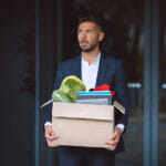 Wrongful Termination Cases: How Labor Attorneys Can Assist You Upset man got fired from an office job. Office worker lost his job. Dismissal from work or job loss.