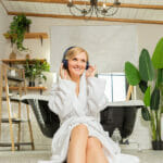 Is Audio Porn Better Than Normal Porn? A Happy Girl In A White Robe And A Towel On Her Head On The Bath