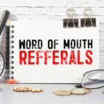 mouth refferals word written on wood block. mouth refferals text on table, concept