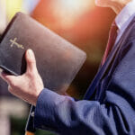 How Incredible it is the Bible Still Teaches People Today? Pastor With A Bible In His Hand During A Sermon. The Preacher De
