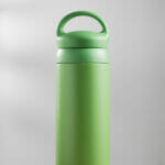 What You Must Know Before Buying Bulk Tumblers Green Tumbler Size 20 Ounce On Wooden Table