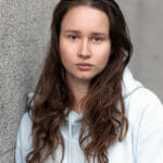 5 Hacks for Achieving the “No Makeup” Makeup Look Young Brunette Woman Without Make-up Looks At Camera, Natural Fe