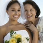 Mother of the Bride Advice: How You Can Best Support Your Daughter? Bride and mother with bouquet