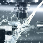 CNC Machining: A Newbie’s Guide Close up of CNC machine at work