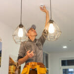 The Best Carbon Monoxide Detector of 2023 Handyman Installing A Smoke Detector On The Ceiling