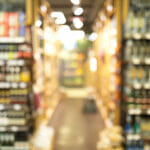 Shelves With Alcohol Drinks In Supermarket, Abstract Blurred Bac