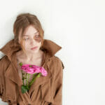 Hyperpigmentation, A Guide Woman With Hyperpigmentation On Face With Flowers