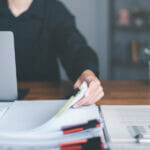 5 Common Mistakes for Taxpayers and How to Avoid Them business accounting documents,auditor,management and auditing of office documents,Reports for Tax Time Analysis,office worker working with documents at home office desk,work at home