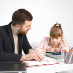 5 Important Skills A Special Education Teacher Must Have Girl with Down syndrome studying with her teacher at home